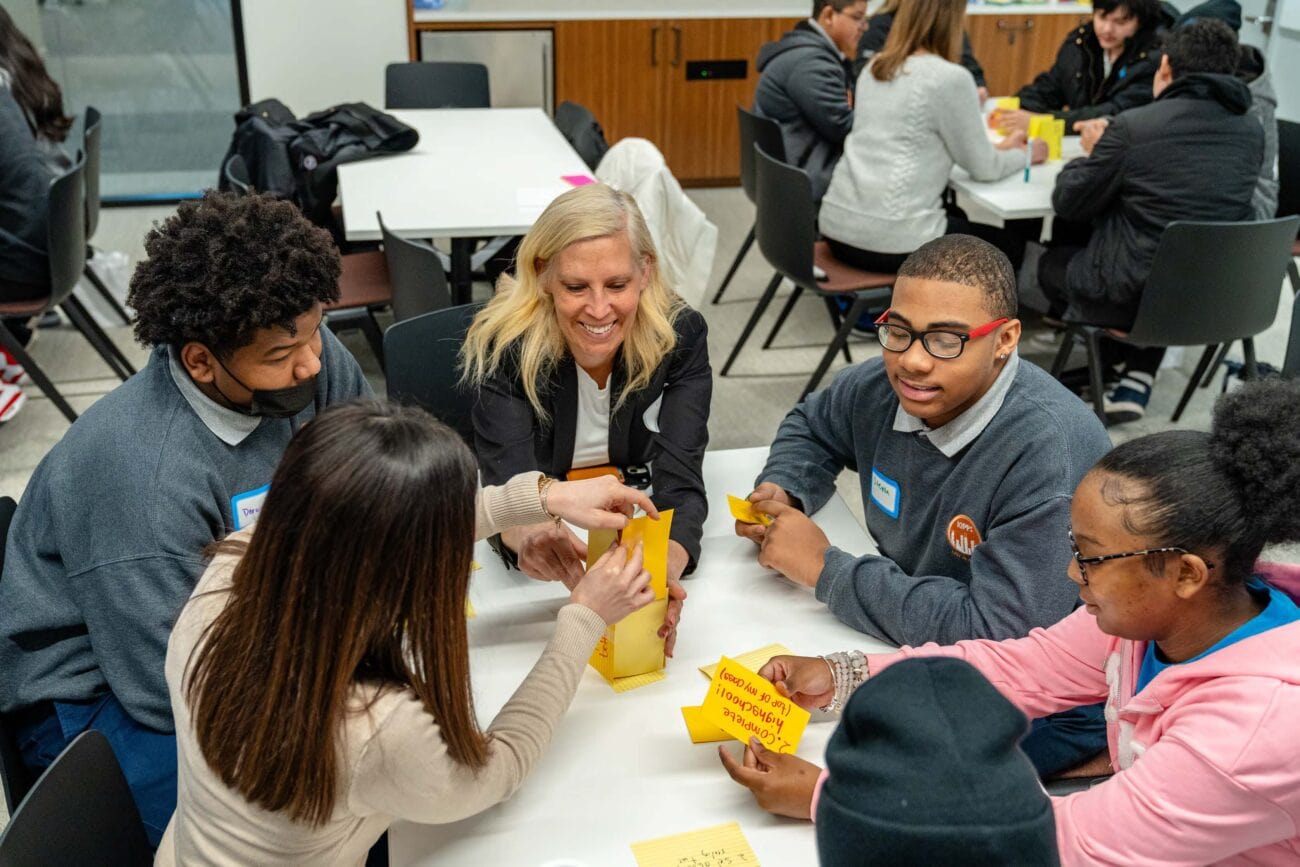 Adams Street volunteers meet with CIS students