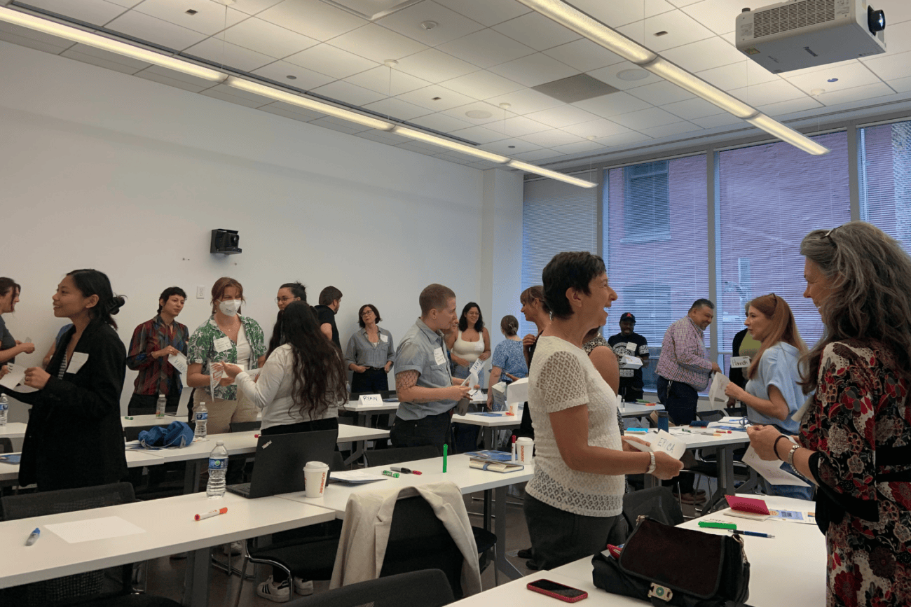 Summer Institute attendees conversing